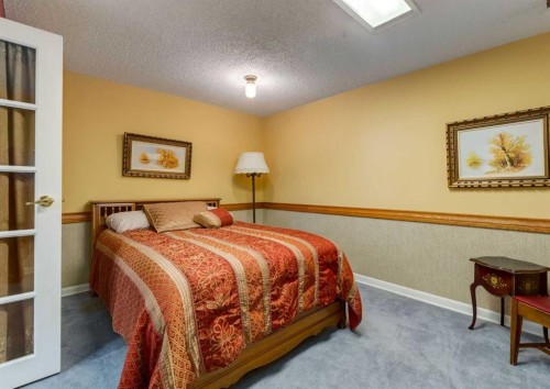 38 Spokane Street Sw, Calgary, AB - Indoor Photo Showing Bedroom