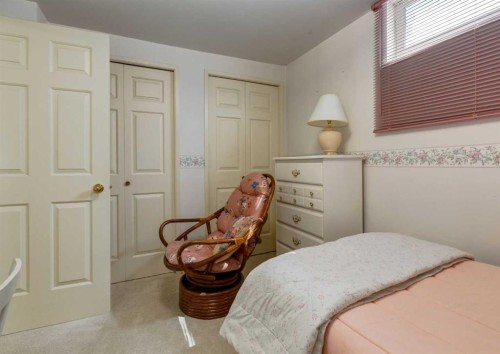 38 Spokane Street Sw, Calgary, AB - Indoor Photo Showing Bedroom