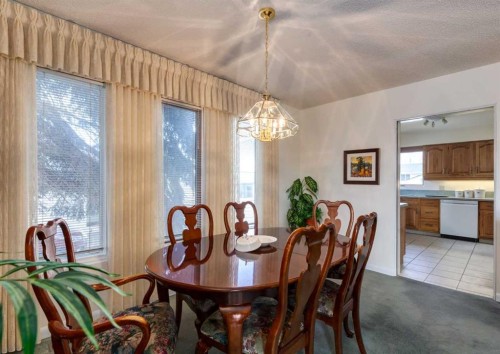 38 Spokane Street Sw, Calgary, AB - Indoor Photo Showing Dining Room