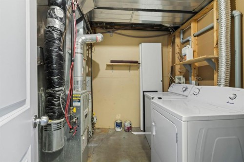 313-103 Strathaven Drive, Strathmore, AB - Indoor Photo Showing Laundry Room