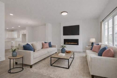 208 Belmont Way Sw, Calgary, AB - Indoor Photo Showing Living Room With Fireplace