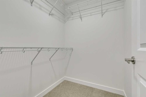208 Belmont Way Sw, Calgary, AB - Indoor With Storage