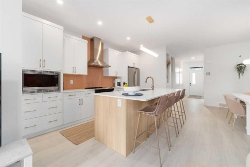 30 Edith Manor Nw, Calgary, AB - Indoor Photo Showing Kitchen With Upgraded Kitchen