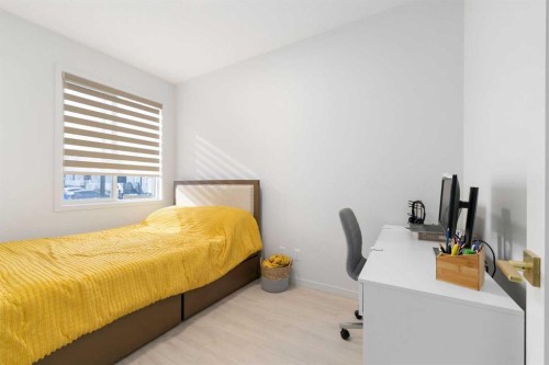 30 Edith Manor Nw, Calgary, AB - Indoor Photo Showing Bedroom