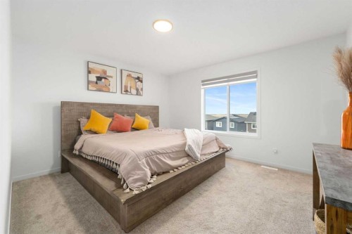30 Edith Manor Nw, Calgary, AB - Indoor Photo Showing Bedroom