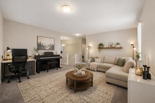 33 Carringham Heights Nw, Calgary, AB - Indoor Photo Showing Living Room