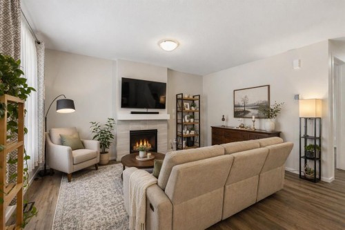 33 Carringham Heights Nw, Calgary, AB - Indoor Photo Showing Living Room With Fireplace