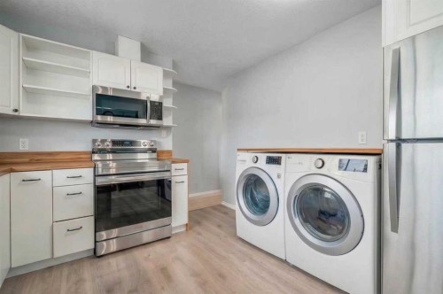 92 2A Street, High River, AB - Indoor Photo Showing Laundry Room