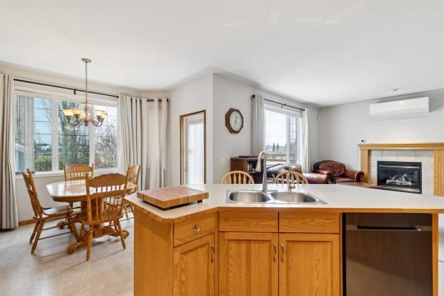 37 Cimarron Trail, Okotoks, AB - Indoor With Fireplace