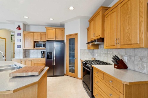 37 Cimarron Trail, Okotoks, AB - Indoor Photo Showing Kitchen With Stainless Steel Kitchen With Double Sink