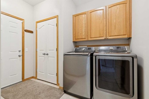 37 Cimarron Trail, Okotoks, AB - Indoor Photo Showing Laundry Room
