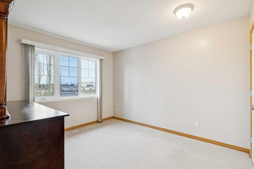 37 Cimarron Trail, Okotoks, AB - Indoor Photo Showing Other Room