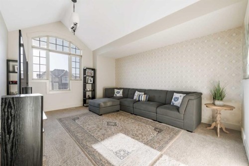 52 Aspen Summit Drive Sw, Calgary, AB - Indoor Photo Showing Living Room