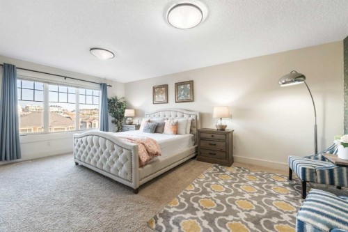 52 Aspen Summit Drive Sw, Calgary, AB - Indoor Photo Showing Bedroom