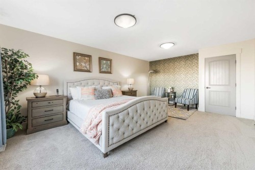52 Aspen Summit Drive Sw, Calgary, AB - Indoor Photo Showing Bedroom