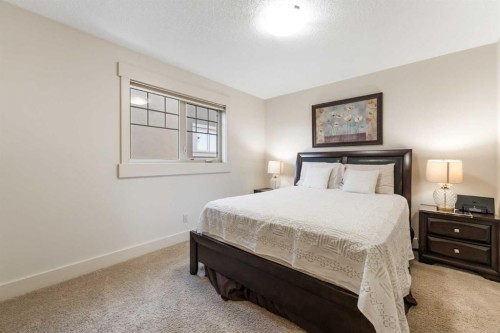 52 Aspen Summit Drive Sw, Calgary, AB - Indoor Photo Showing Bedroom