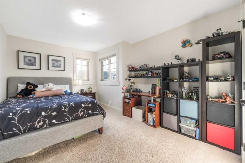 52 Aspen Summit Drive Sw, Calgary, AB - Indoor Photo Showing Bedroom