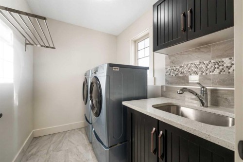 52 Aspen Summit Drive Sw, Calgary, AB - Indoor Photo Showing Laundry Room