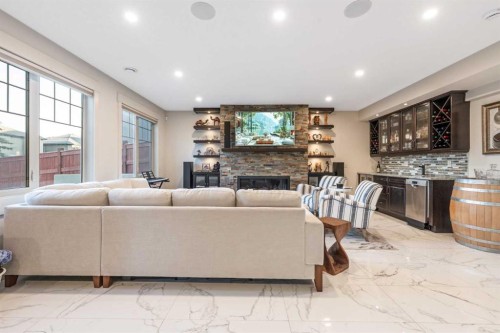 52 Aspen Summit Drive Sw, Calgary, AB - Indoor Photo Showing Other Room With Fireplace