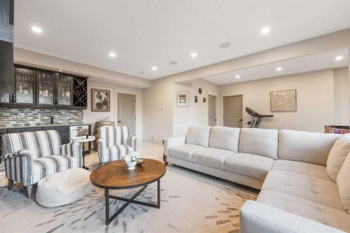 52 Aspen Summit Drive Sw, Calgary, AB - Indoor Photo Showing Living Room