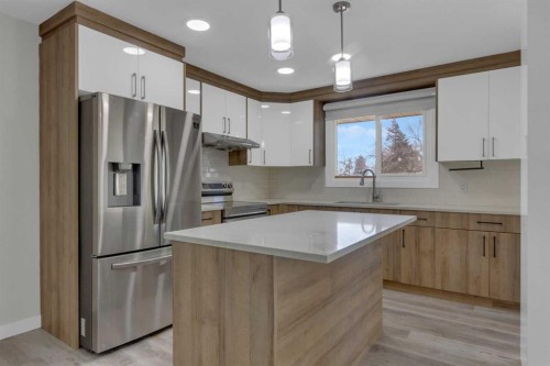 99 Dovercliffe Way Se, Calgary, AB - Indoor Photo Showing Kitchen With Upgraded Kitchen