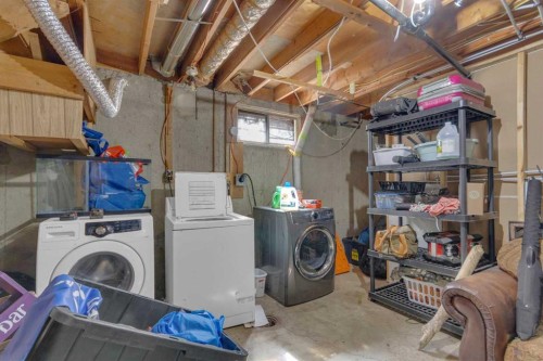 99 Dovercliffe Way Se, Calgary, AB - Indoor Photo Showing Laundry Room