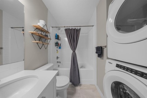 79 Sage Bluff Circle Nw, Calgary, AB - Indoor Photo Showing Laundry Room