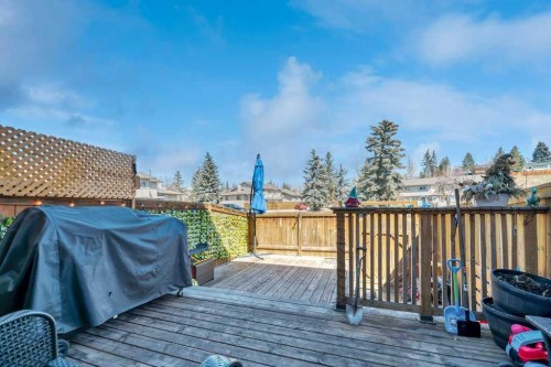 75 Deerfield Drive Se, Calgary, AB - Outdoor With Deck Patio Veranda