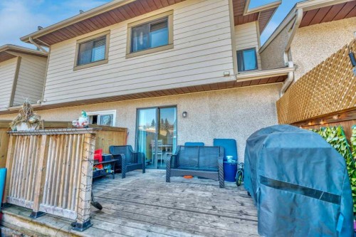 75 Deerfield Drive Se, Calgary, AB - Outdoor With Deck Patio Veranda With Exterior