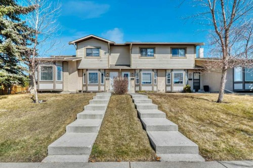75 Deerfield Drive Se, Calgary, AB - Outdoor With Facade