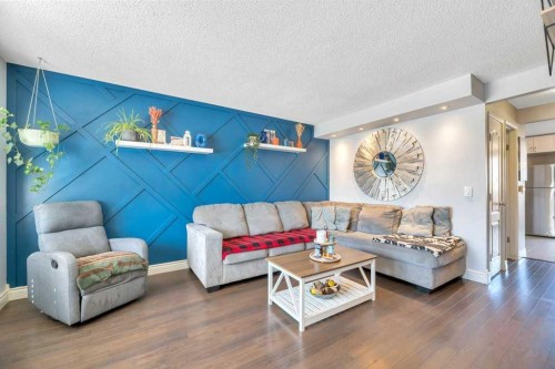 75 Deerfield Drive Se, Calgary, AB - Indoor Photo Showing Living Room