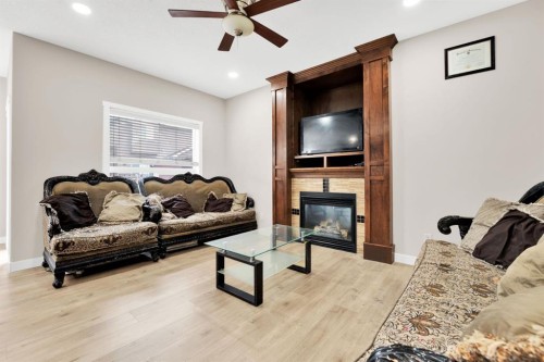 360 Saddlemont Boulevard Ne, Calgary, AB - Indoor With Fireplace