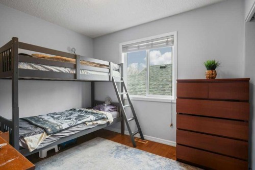 14760 Mt Mckenzie Drive Se, Calgary, AB - Indoor Photo Showing Bedroom