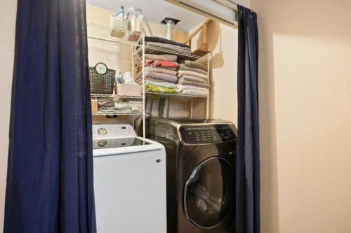 14760 Mt Mckenzie Drive Se, Calgary, AB - Indoor Photo Showing Laundry Room
