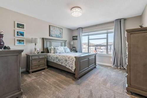 91 Wolf Hollow Park Se, Calgary, AB - Indoor Photo Showing Bedroom