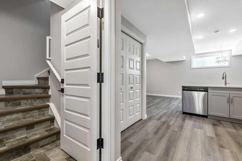 91 Wolf Hollow Park Se, Calgary, AB - Indoor Photo Showing Other Room