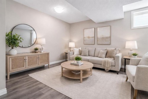 91 Wolf Hollow Park Se, Calgary, AB - Indoor Photo Showing Living Room