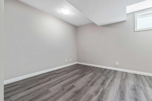 91 Wolf Hollow Park Se, Calgary, AB - Indoor Photo Showing Other Room