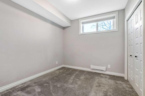 91 Wolf Hollow Park Se, Calgary, AB - Indoor Photo Showing Other Room