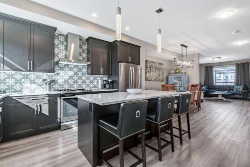 91 Wolf Hollow Park Se, Calgary, AB - Indoor Photo Showing Kitchen With Stainless Steel Kitchen With Upgraded Kitchen