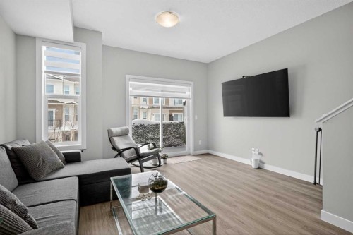 930 Sage Hill Grove Nw, Calgary, AB - Indoor Photo Showing Living Room