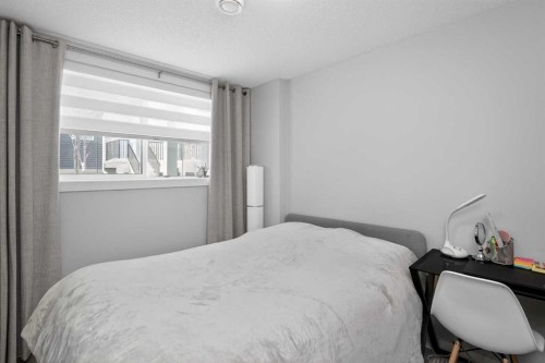 930 Sage Hill Grove Nw, Calgary, AB - Indoor Photo Showing Bedroom