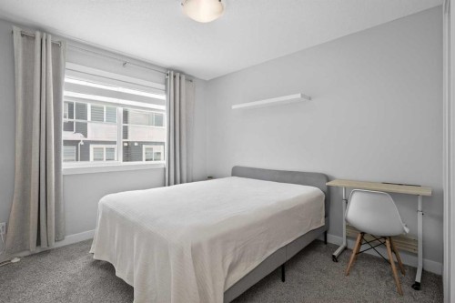 930 Sage Hill Grove Nw, Calgary, AB - Indoor Photo Showing Bedroom
