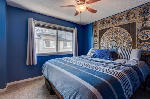 173 New Brighton Point Se, Calgary, AB - Indoor Photo Showing Bedroom