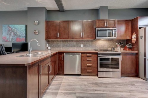 173 New Brighton Point Se, Calgary, AB - Indoor Photo Showing Kitchen With Stainless Steel Kitchen With Double Sink