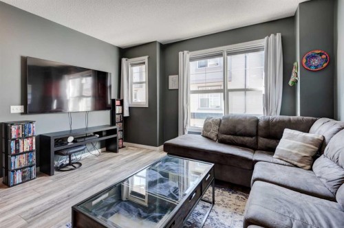 173 New Brighton Point Se, Calgary, AB - Indoor Photo Showing Living Room