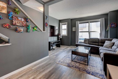 173 New Brighton Point Se, Calgary, AB - Indoor Photo Showing Living Room