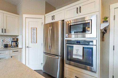 412-10 Walgrove Walk Se, Calgary, AB - Indoor Photo Showing Kitchen With Stainless Steel Kitchen