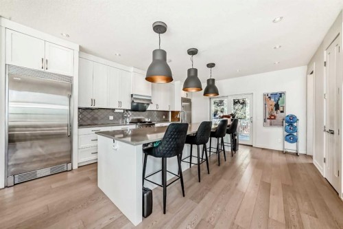112 Hanover Road Sw, Calgary, AB - Indoor Photo Showing Kitchen With Stainless Steel Kitchen With Upgraded Kitchen