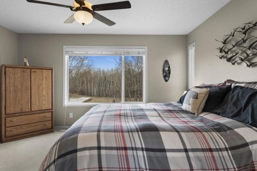 66 Tuscany Reserve Gate Nw, Calgary, AB - Indoor Photo Showing Bedroom